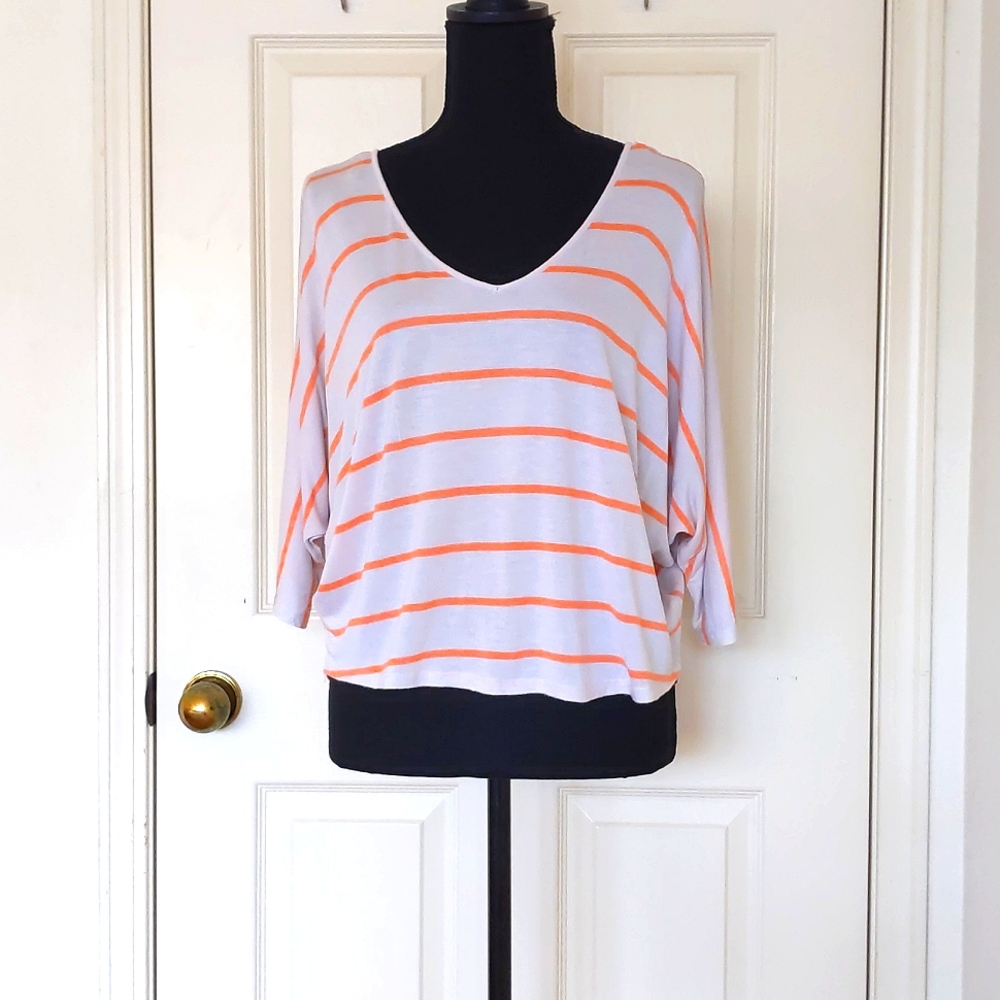 NWOT. Express 100% Rayon Half Sleeve Loose Fit V-Neck Top with orange stripes.